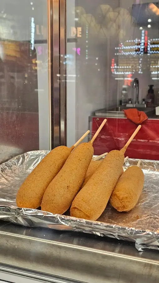 Smitty's Buttermilk Corn Dogs stand at night