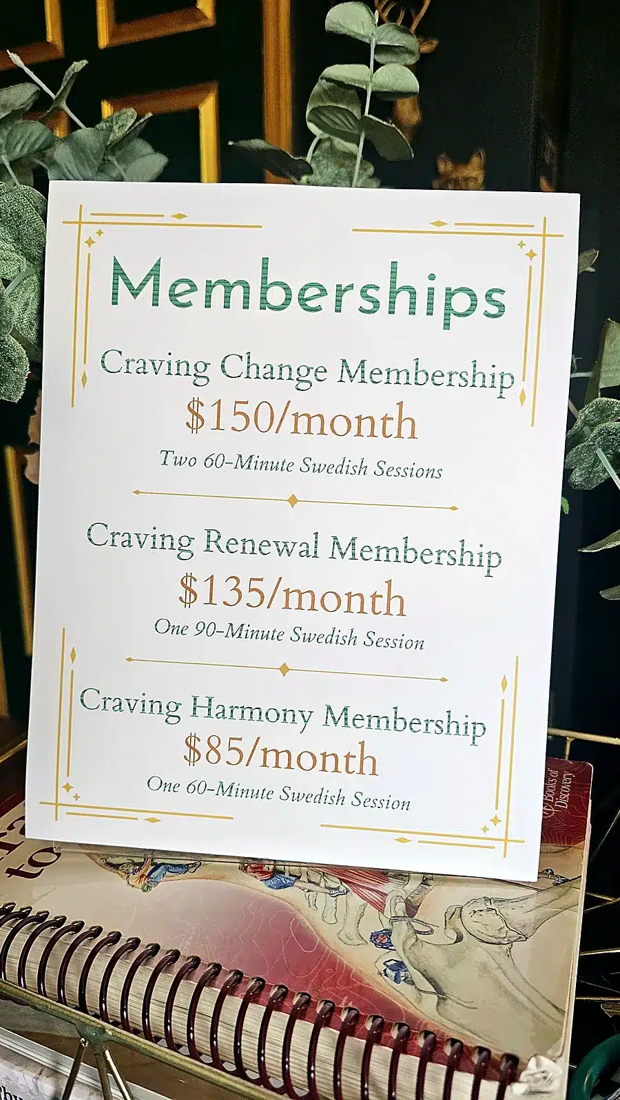 Membership pricing sign at Massage Craving listing Craving Change, Craving Renewal and Craving Harmony monthly memberships